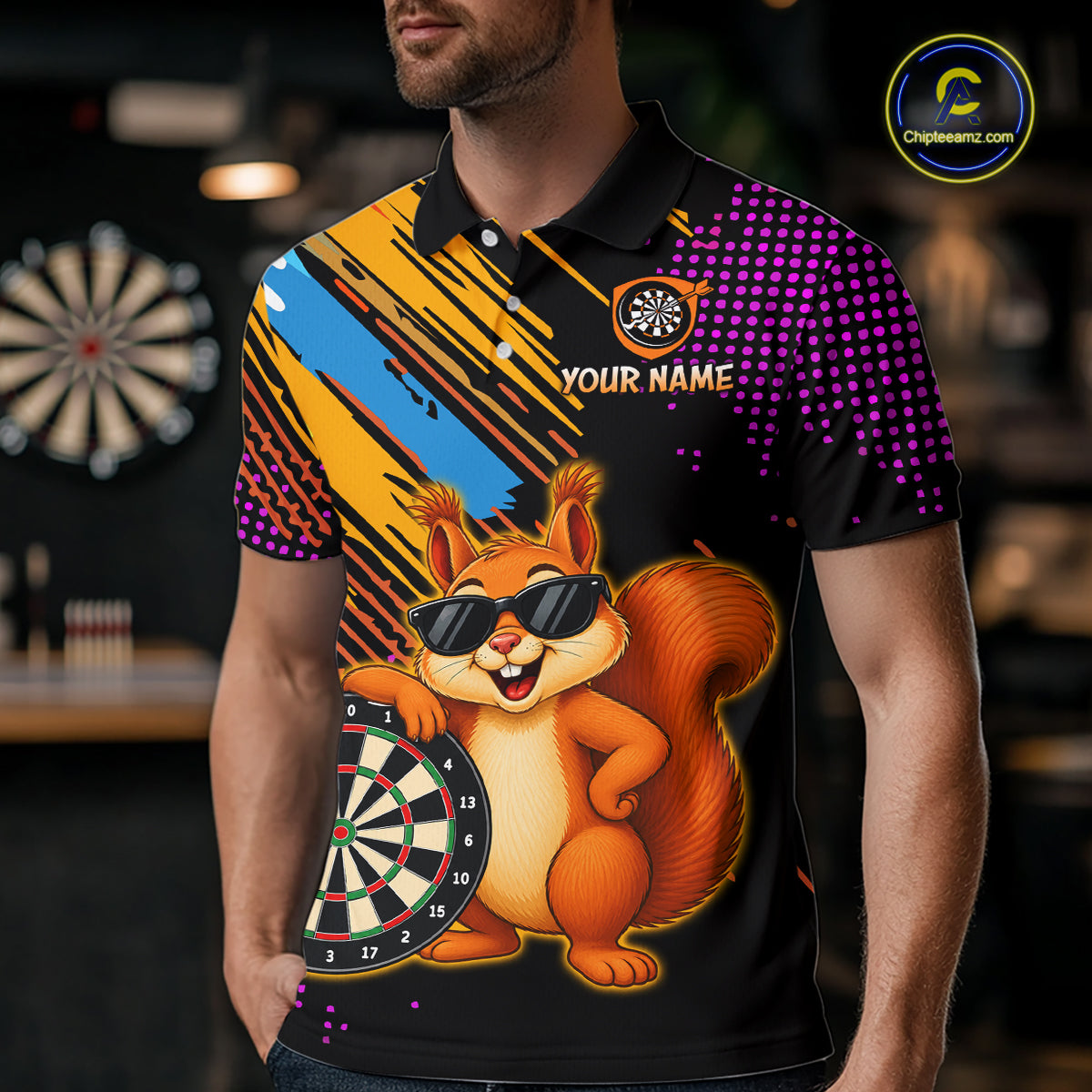 Person wearing a colorful polo shirt with a cartoon squirrel and dartboard design, in an indoor setting.