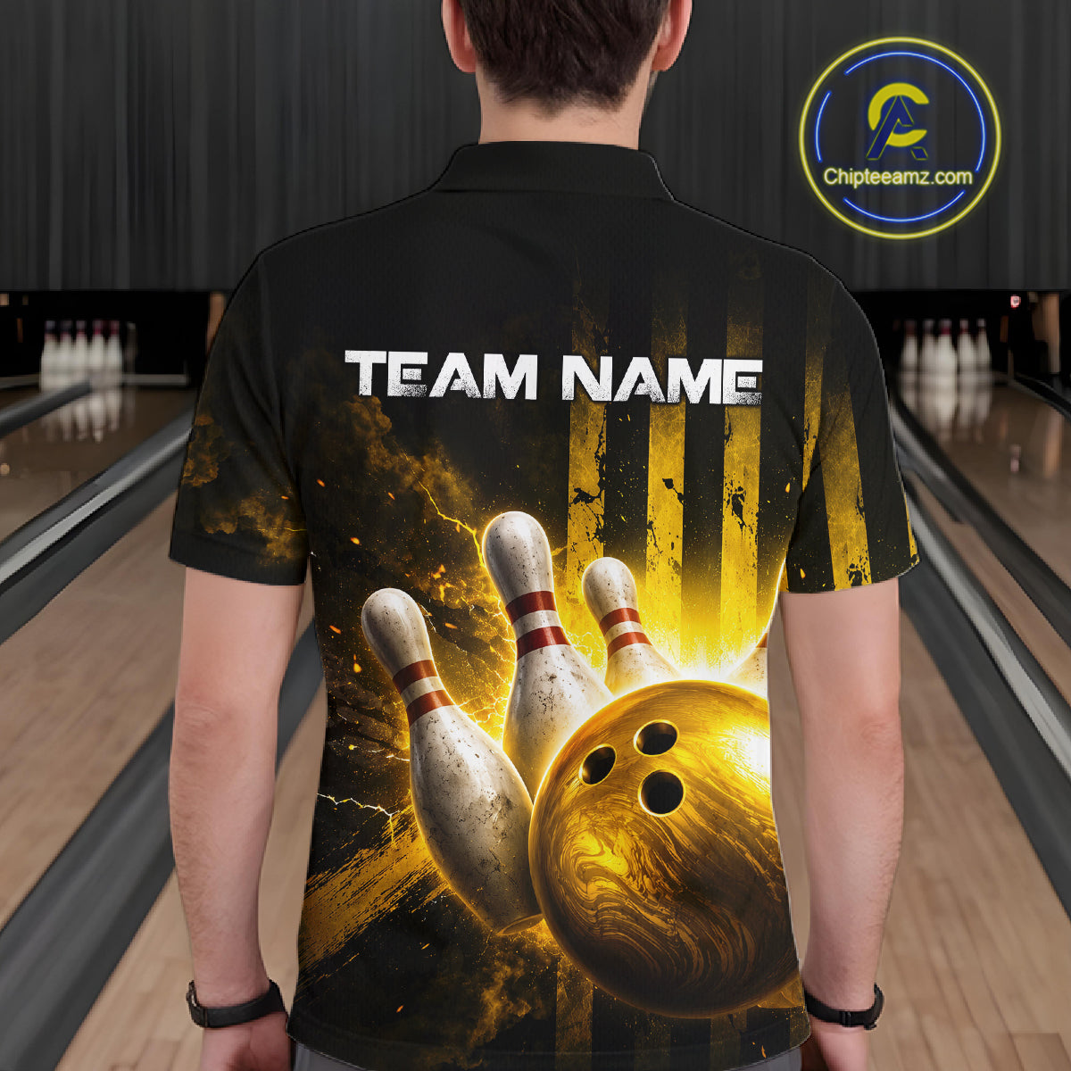 Person wearing a black bowling-themed shirt with 'TEAM NAME' text in a bowling alley.