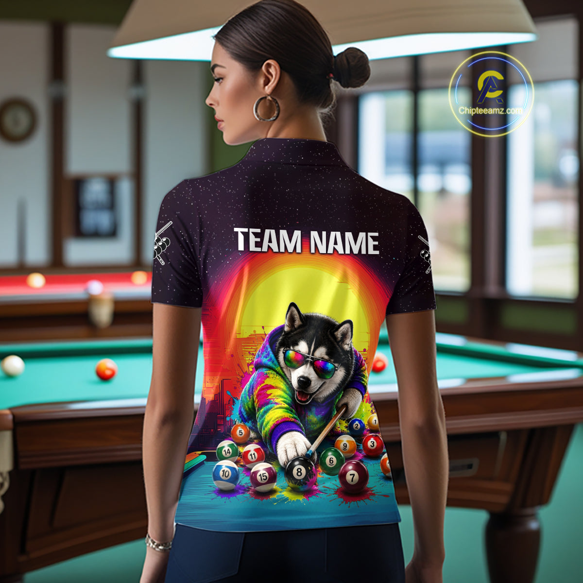 Person wearing a shirt with a colorful design of a dog playing pool in a billiards room.