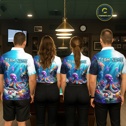 Four people wearing matching colorful shirts with an octopus design in a room.
