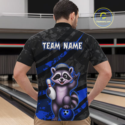 Person wearing a bowling-themed shirt with a raccoon graphic in a bowling alley.