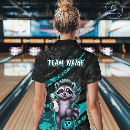 Person wearing a bowling shirt with a raccoon graphic and 'Team Name' text in a bowling alley.