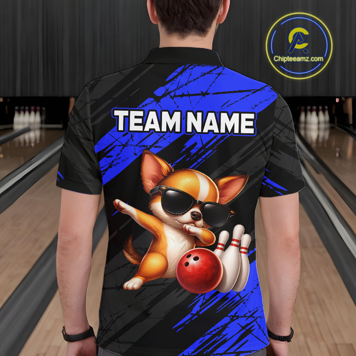 Person wearing a bowling shirt with a dog graphic and 'TEAM NAME' text in a bowling alley.