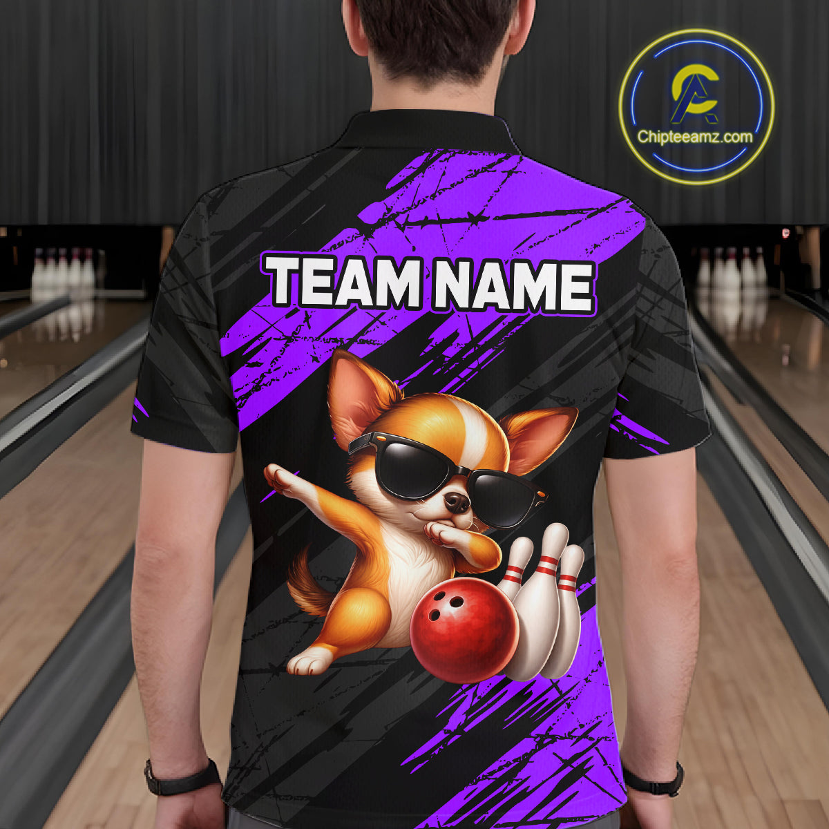 Person wearing a bowling shirt with a dog graphic and 'TEAM NAME' text in a bowling alley.
