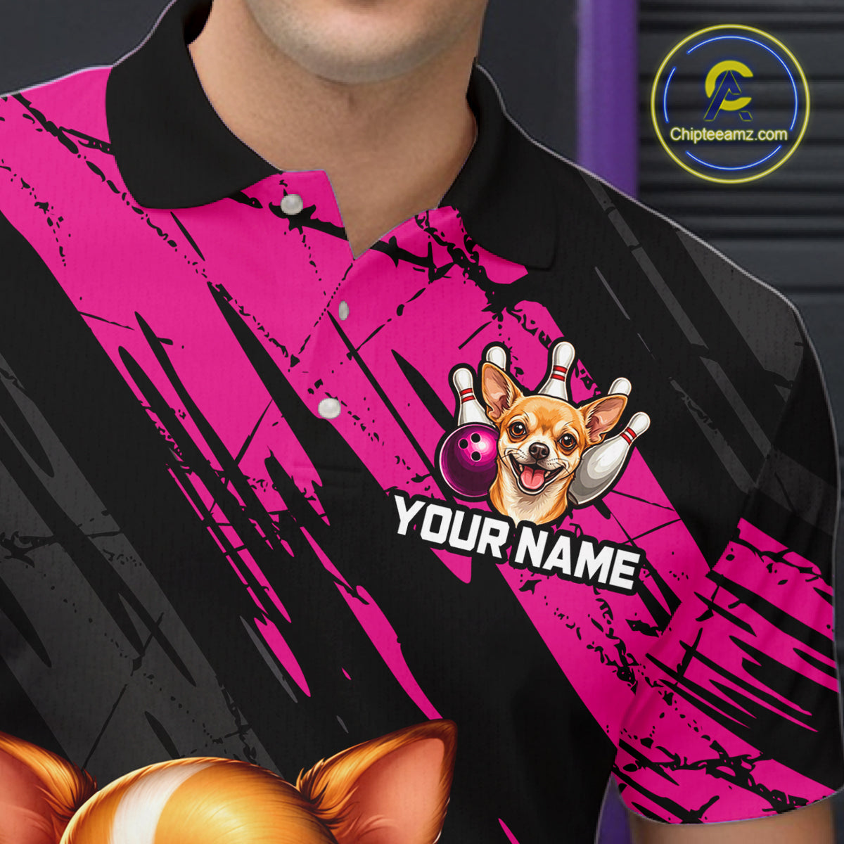 Black and pink polo shirt with a dog graphic and customizable text on a blurred background.