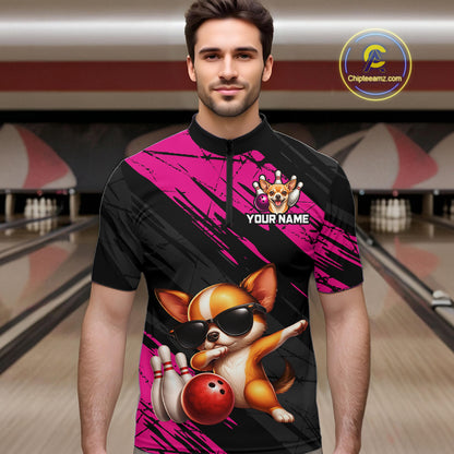 Man wearing a bowling-themed shirt with a dog graphic in a bowling alley.