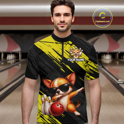 Man wearing a black and yellow bowling-themed shirt with a dog graphic in a bowling alley.