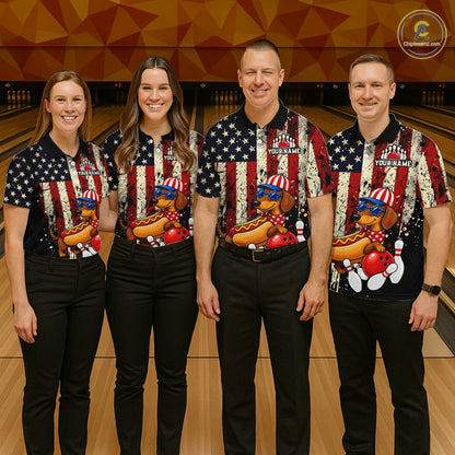 Four people wearing matching bowling shirts with American flag and hot dog design on a bowling alley.