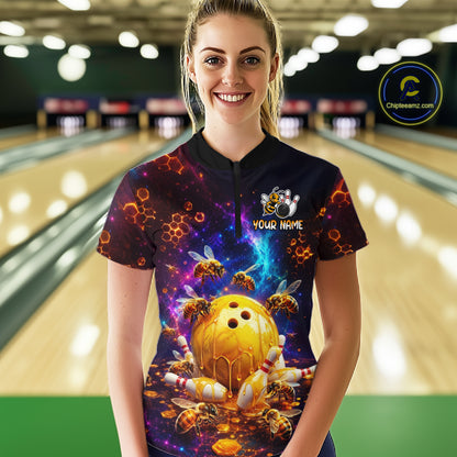 Woman wearing of a dark bowling quarter zip with cosmic honeycomb graphics, bees, honey-dripping bowling balls, pins, and custom your name text.