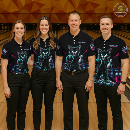 Four people standing together in a bowling alley wearing matching black short-sleeve polo shirts with a colorful neon cat graphic and 'YOUR NAME' text on the chest, paired with black pants.