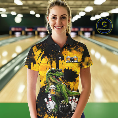 Women wearing bowling polo shirt featuring a dinosaur holding beer with bowling pins and ball artwork on black yellow background.