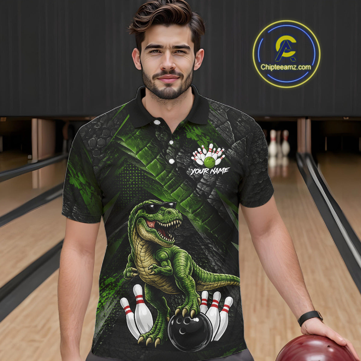 Man wearing bowling polo shirt featuring a dinosaur standing among bowling pins and ball artwork on black green textured background.