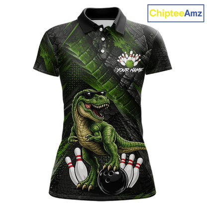 Front bowling polo shirt featuring a dinosaur standing among bowling pins and ball artwork on black green textured background.