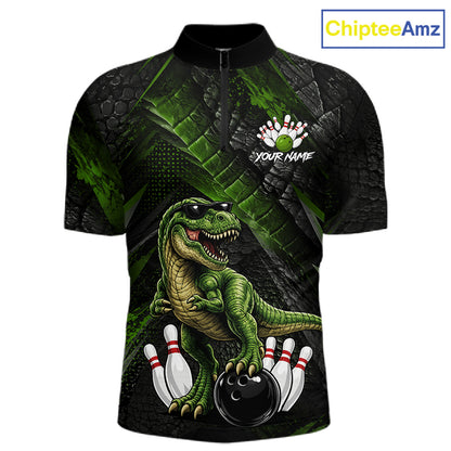 Front bowling quarter zip shirt featuring a dinosaur standing among bowling pins and ball artwork on black green textured background.