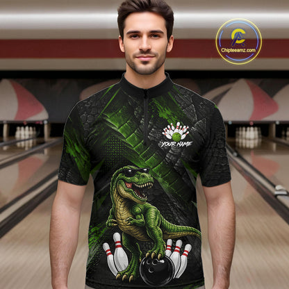 Man wearing bowling quarter zip shirt featuring a dinosaur standing among bowling pins and ball artwork on black green textured background.