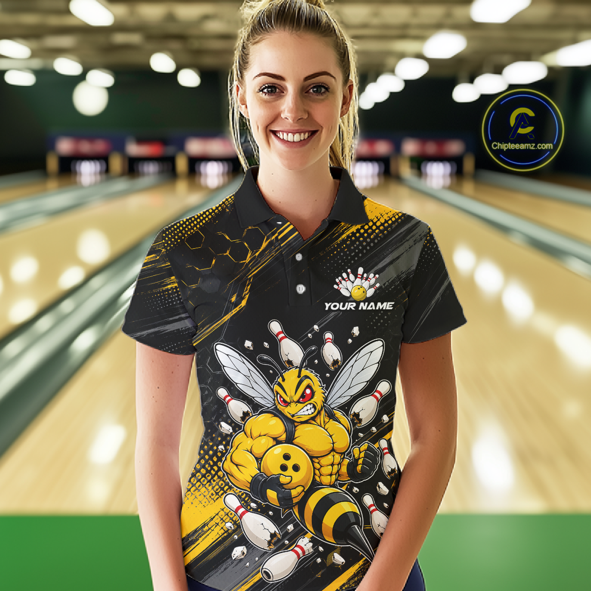 Women wearing bowling polo shirt featuring a muscular bee holding a bowling ball surrounded by pins on black yellow background.