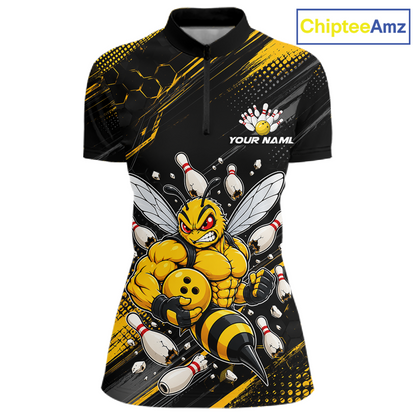 Front bowling quarter zip shirt featuring a muscular bee holding a bowling ball surrounded by pins on black yellow background.