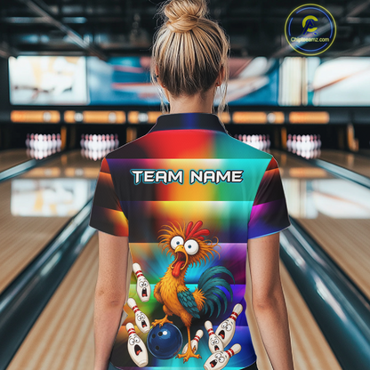 Woman wearing a colorful bowling quarter zip featuring a shocked rooster chicken, blue bowling ball, surprised pins, and custom team name text.