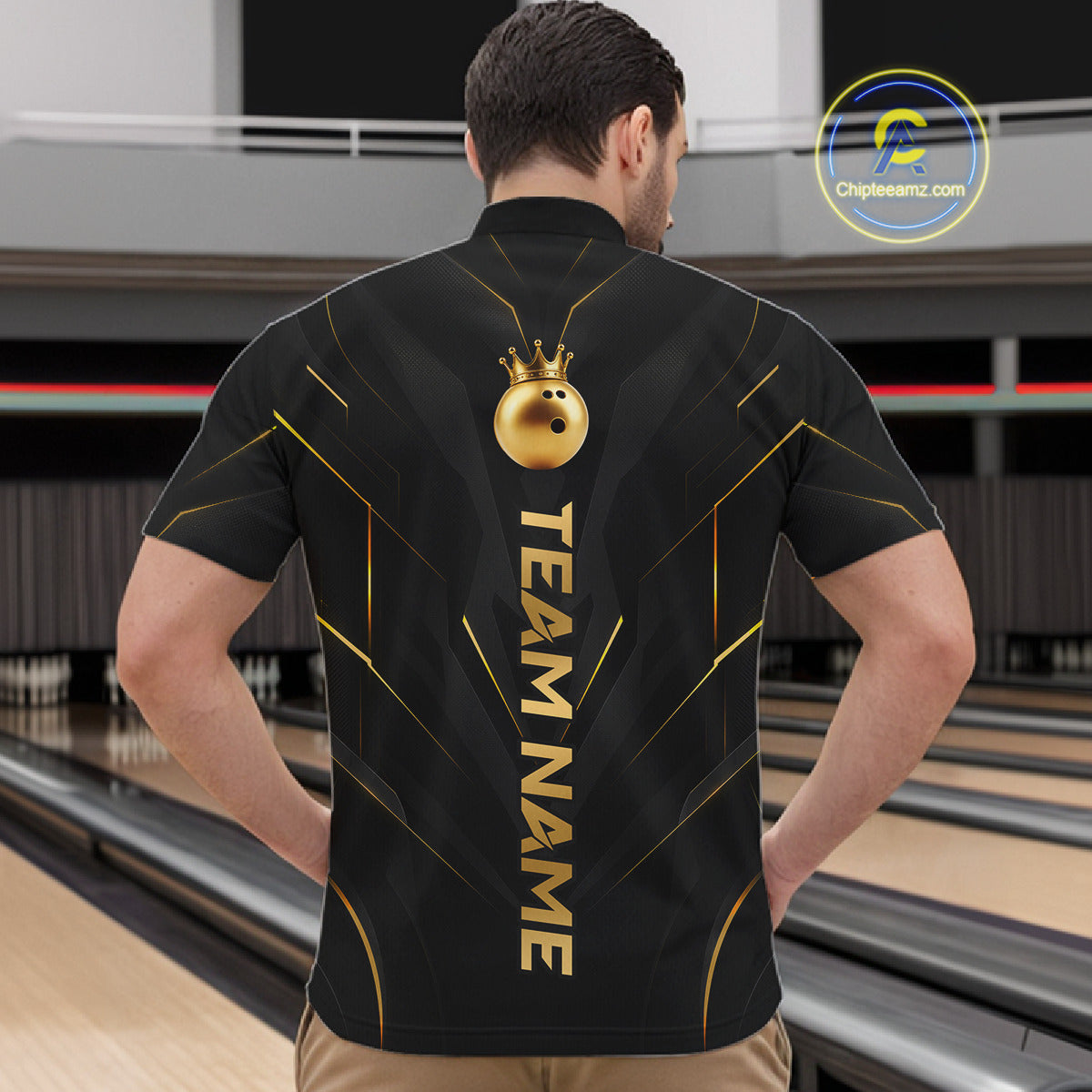 Men wearing personalized bowling quarter zip shirt with a crowned bowling ball accent paired with gold line patterns across a black layout.