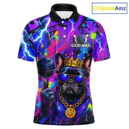 Front view personalized bowling polo shirt with a crowned bulldog holding a bowling ball, surrounded by paint effects and bold graphic patterns.