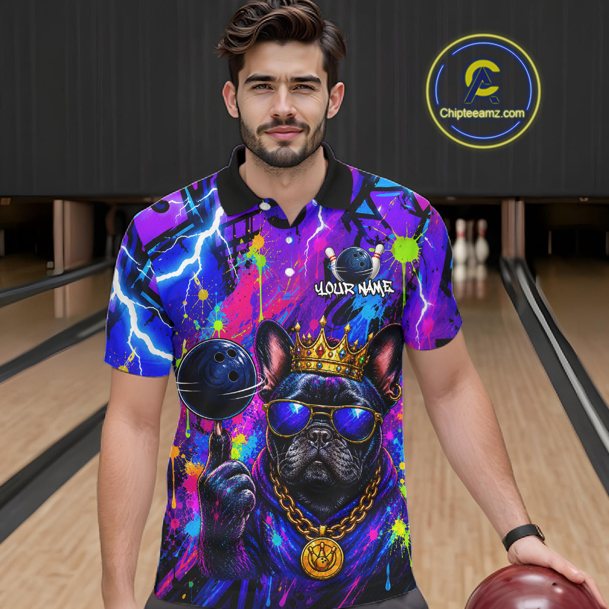 Men wearing personalized bowling polo shirt with a crowned bulldog holding a bowling ball, surrounded by paint effects and bold graphic patterns.
