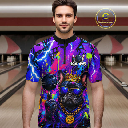 Men wearing personalized bowling quarter zip shirt with a crowned bulldog holding a bowling ball, surrounded by paint effects and bold graphic patterns.
