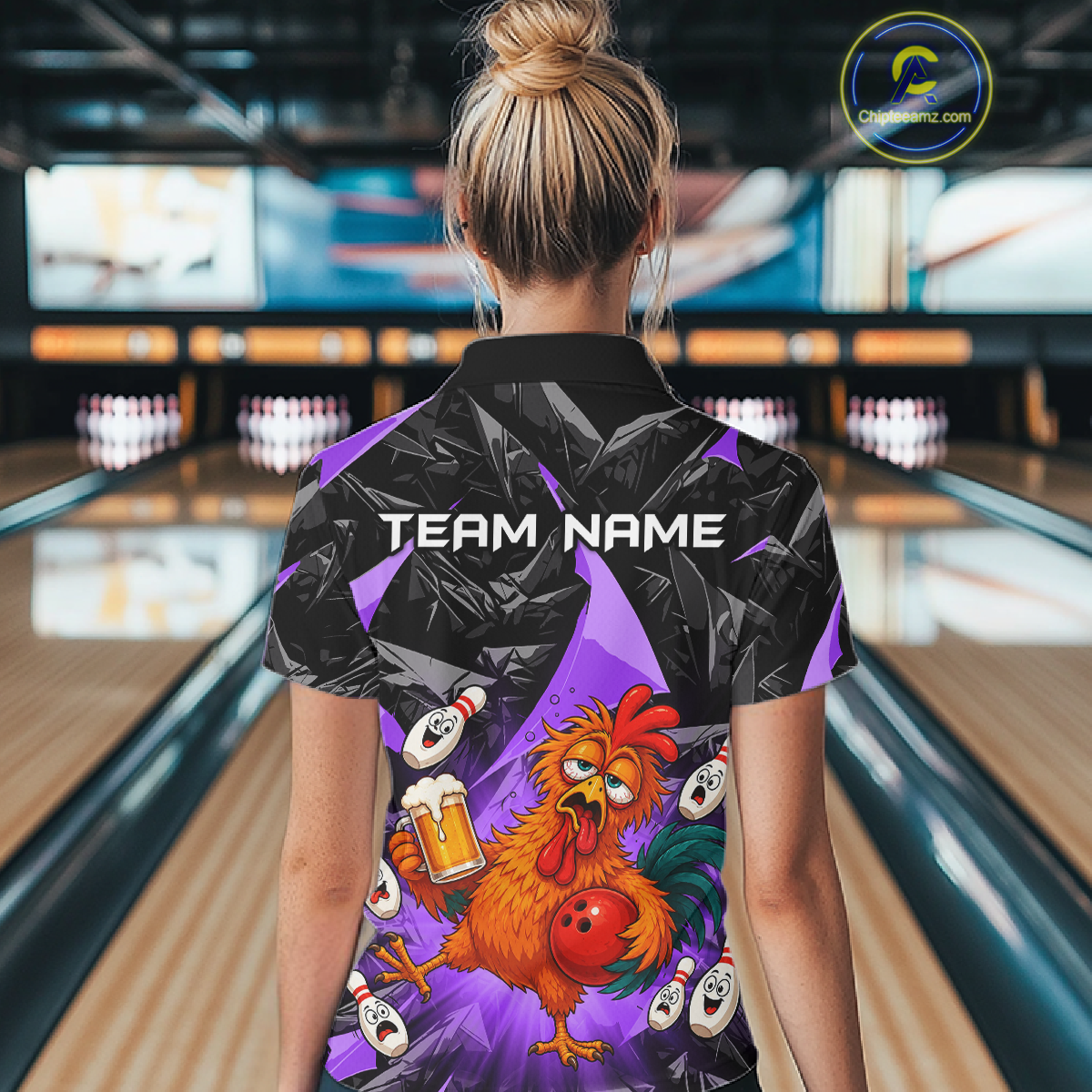Woman wearing a black and purple bowling polo featuring a wild rooster mascot holding a beer mug and red bowling ball, with custom team name text.