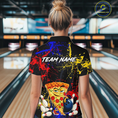 Woman wearing a black bowling quarter zip featuring colorful red, yellow, and blue paint splatter graphics, a cartoon pizza slice mascot, bowling pins, and custom team name text.