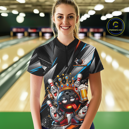 Women wearing personalized bowling quarter zip shirt with a crowned bowling ball character surrounded by pins and angled graphic patterns across a black layout.