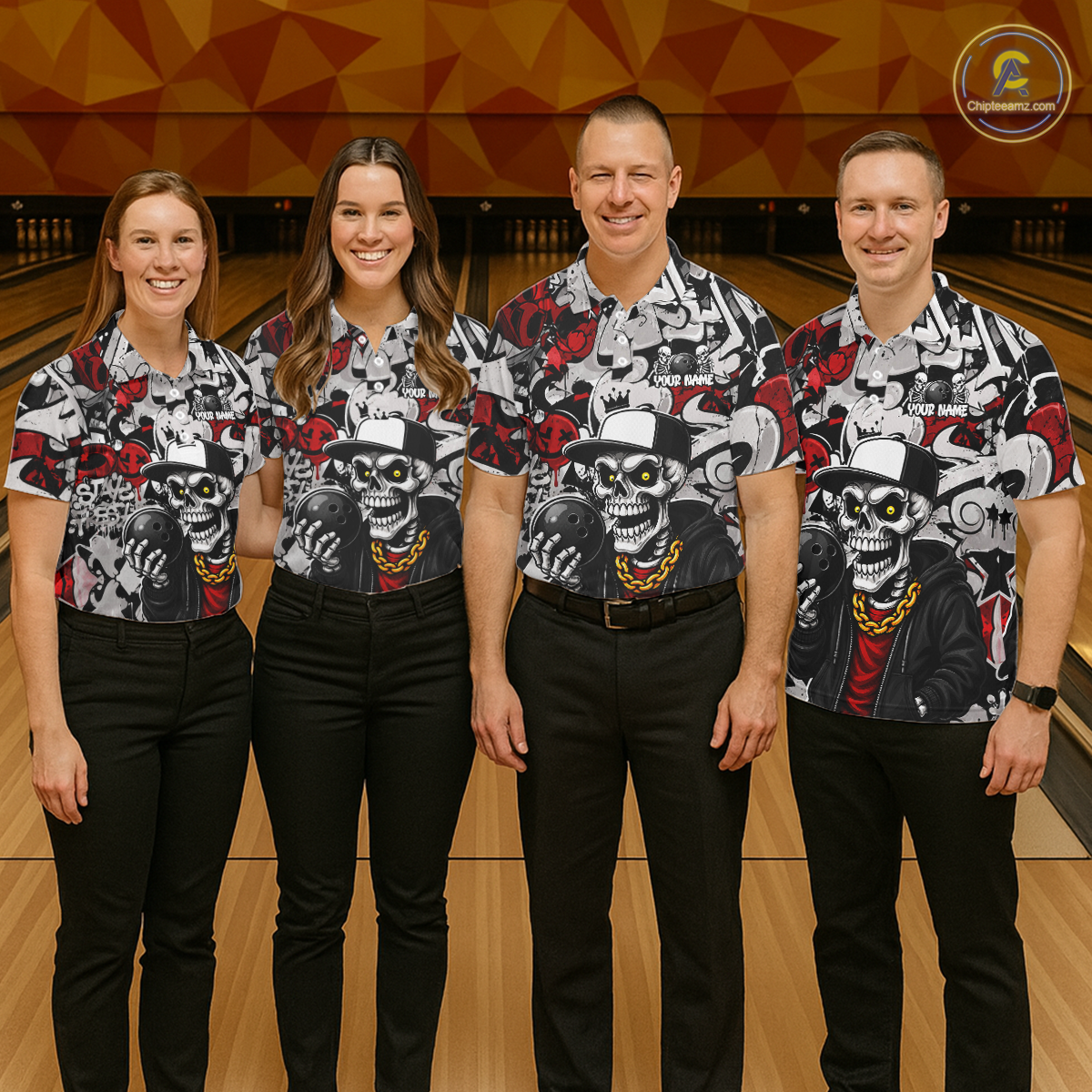 Four people wearing matching shirts with a skull design in a bowling alley.