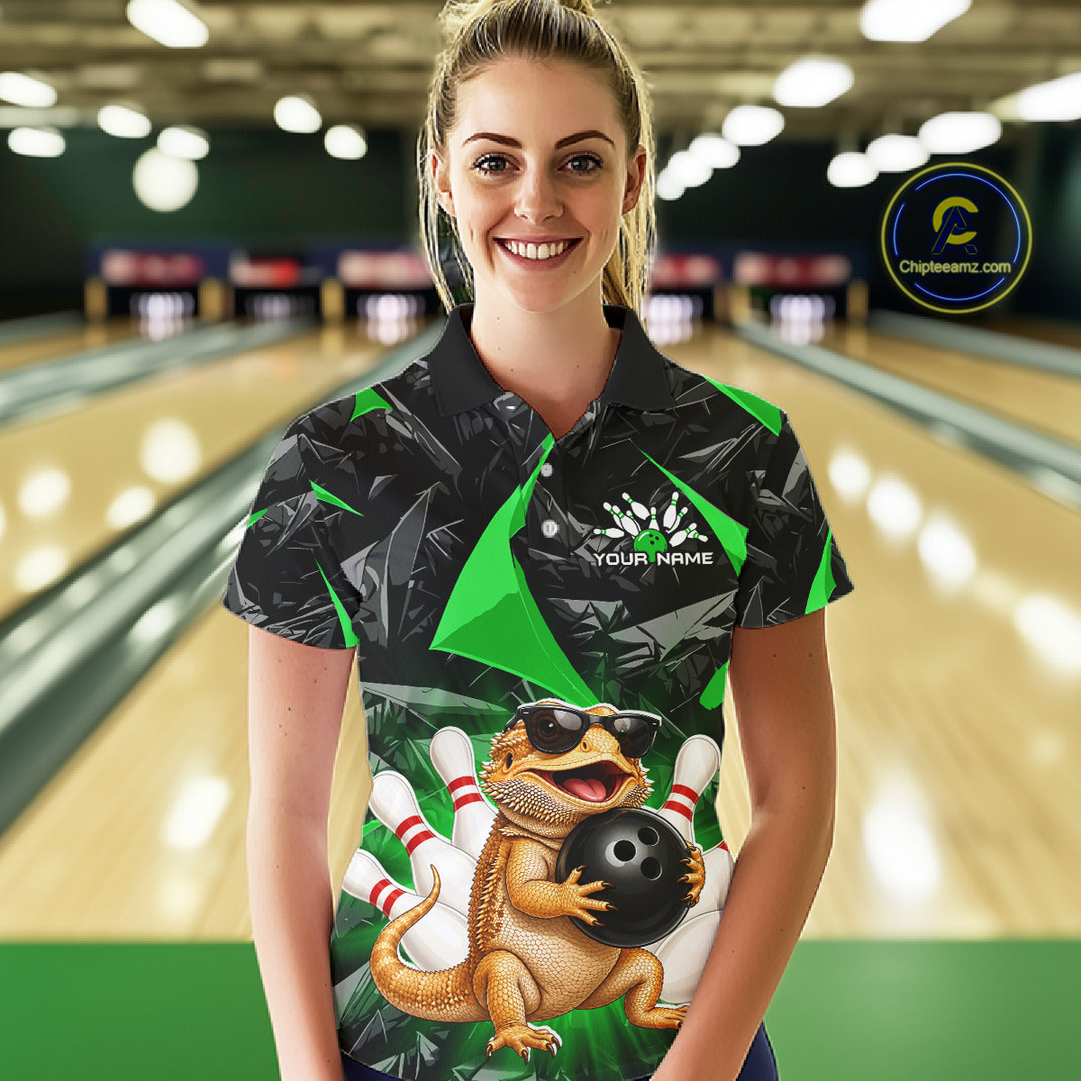 Women’s green bearded dragon bowling polo shirt, back view on female model in bowling lane 
