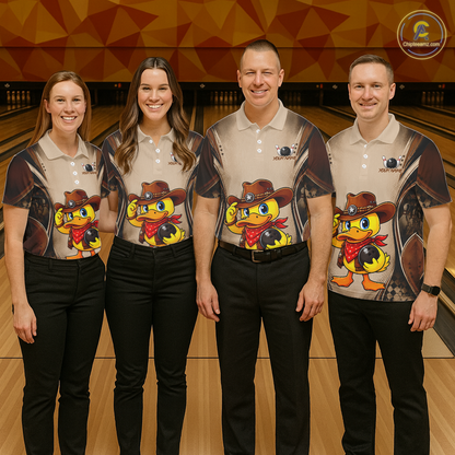Four people wearing matching shirts with a cartoon duck design on a bowling alley.