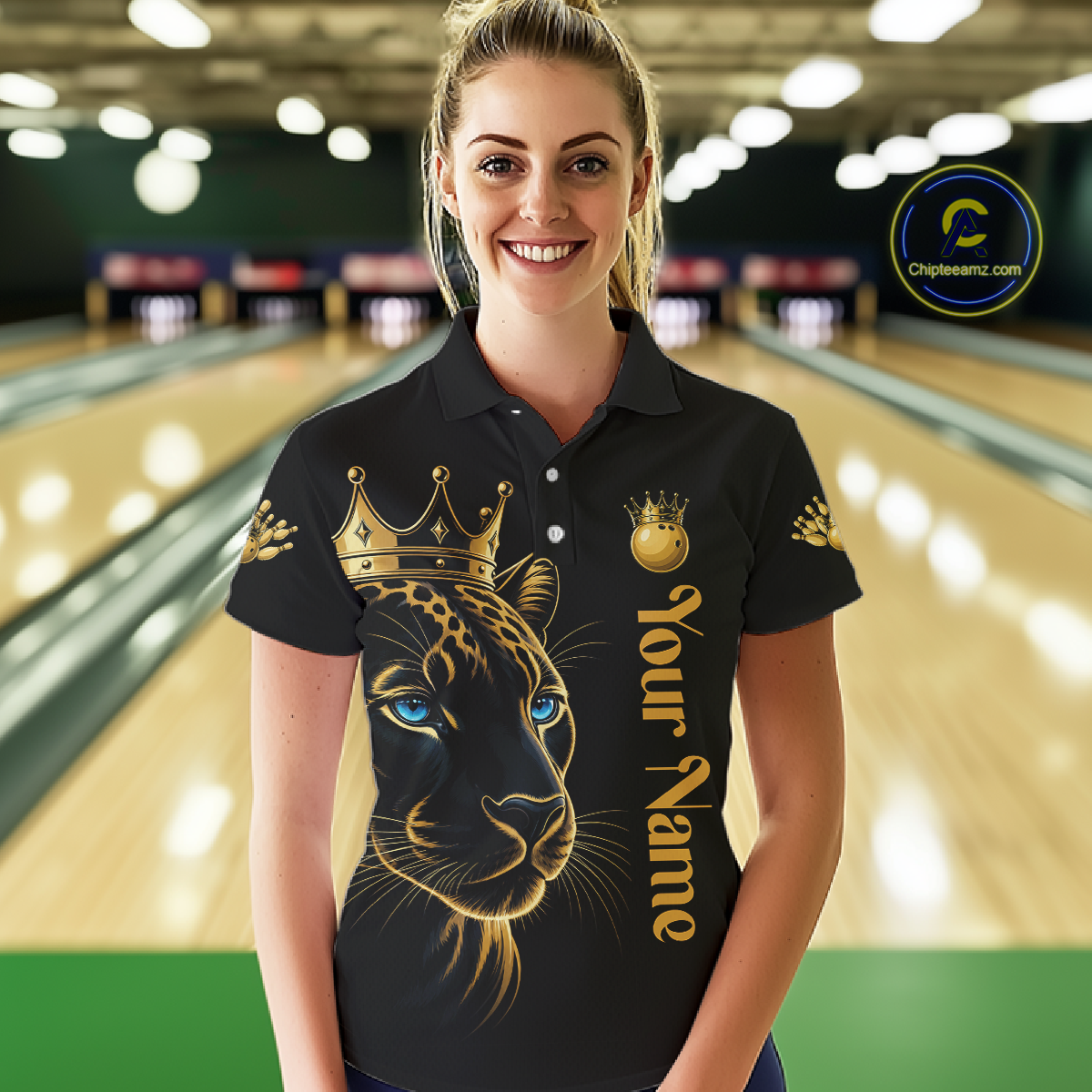 Woman wearing a black shirt with a gold panther design and 'Your Name' text in a bowling alley.