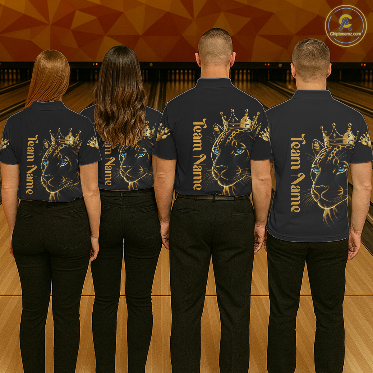 Four people wearing matching black shirts with a lion design and 'Team Name' text on a bowling alley background.