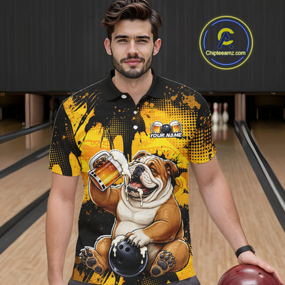 Man wearing a black and yellow polo shirt with a bulldog graphic in a bowling alley.
