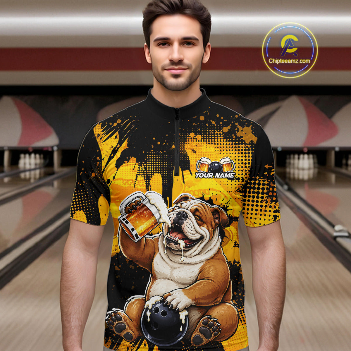 Man wearing a colorful shirt with a bulldog holding a beer and bowling ball in a bowling alley.