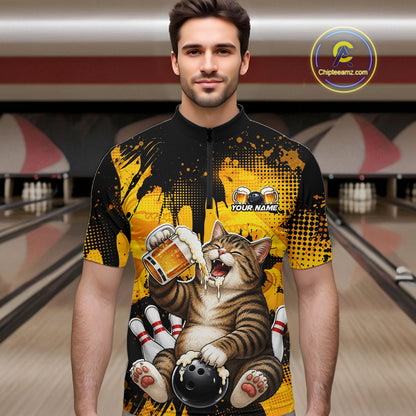Man wearing a colorful bowling-themed shirt with a cat design in a bowling alley.