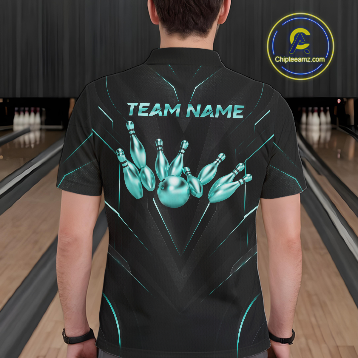 Person wearing a black bowling shirt with teal graphics and 'TEAM NAME' text in a bowling alley.