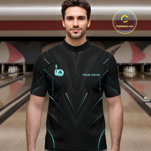 Load image into Gallery viewer, Man wearing a black bowling shirt with teal accents in a bowling alley.
