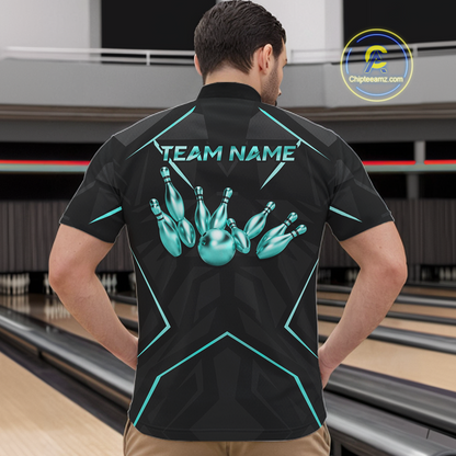 Person wearing a black bowling shirt with teal design and 'Team Name' text in a bowling alley.