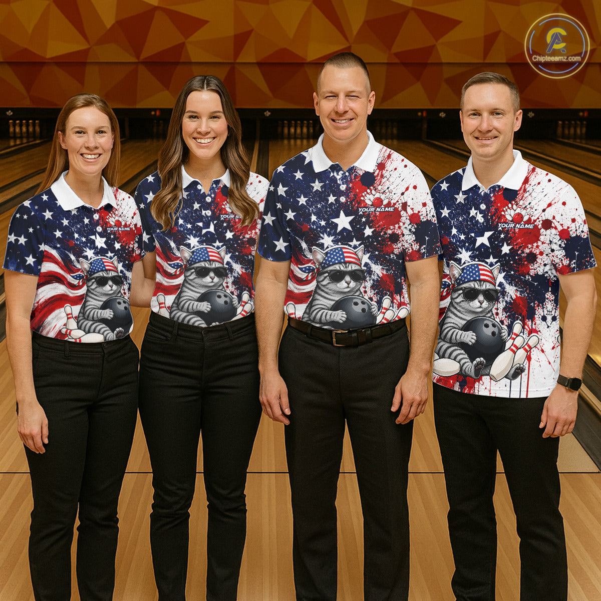 Four people wearing matching bowling shirts with a patriotic design on a bowling alley.
