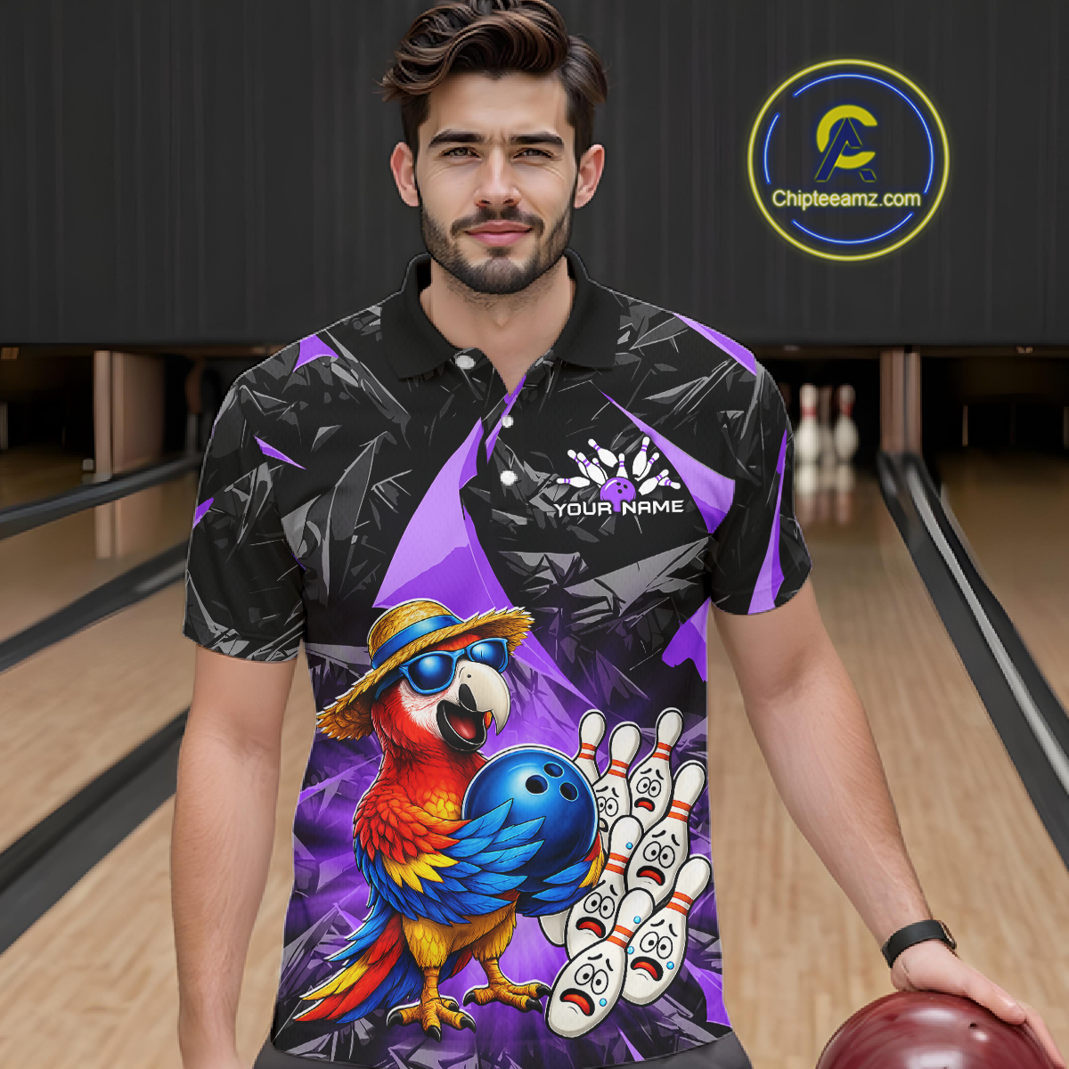 Man wearing a colorful bowling shirt with a parrot design in a bowling alley.