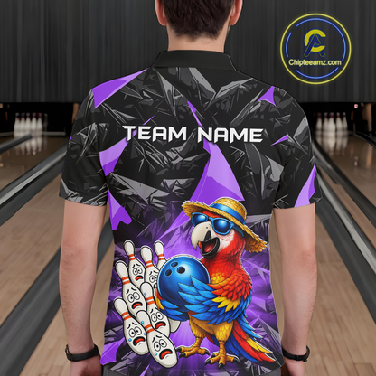 Person wearing a colorful bowling shirt with a parrot design in a bowling alley.