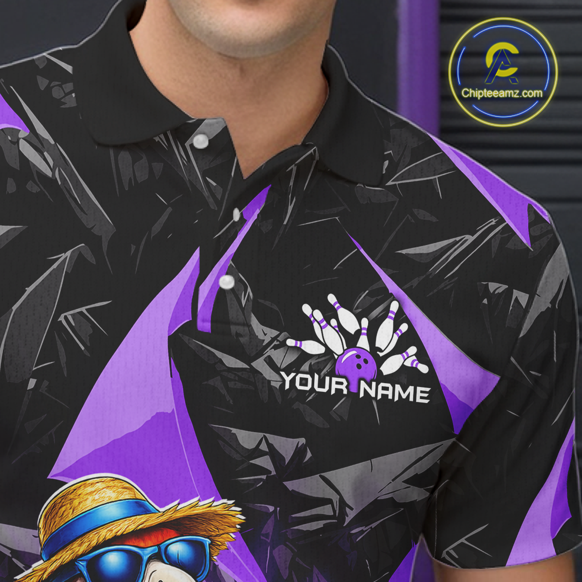 Black and purple bowling shirt with a logo and text on a dark background