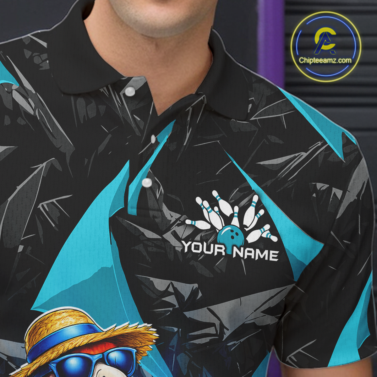 Black and blue bowling shirt with a logo and text on a dark background