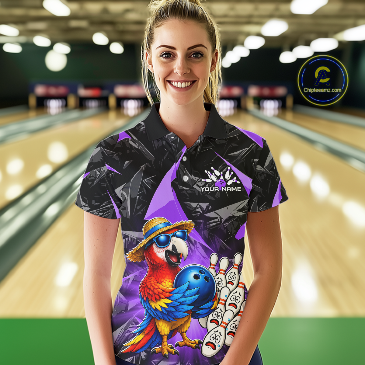 Woman wearing a bowling shirt with a parrot design in a bowling alley.