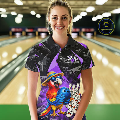 Woman wearing a bowling shirt with a parrot design in a bowling alley.