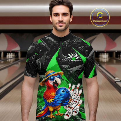 Man wearing a colorful bowling shirt with a parrot design in a bowling alley.