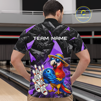 Man wearing a colorful bowling shirt with a parrot design in a bowling alley.