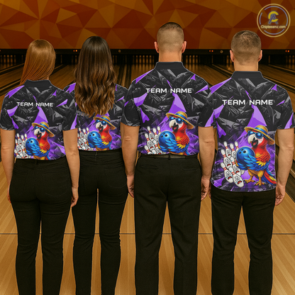 Four people wearing matching bowling shirts with colorful parrot designs on a bowling alley.